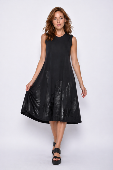 Woman wearing a black sleeveless dress on a white background