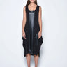 Woman wearing a black sleeveless dress on a white background